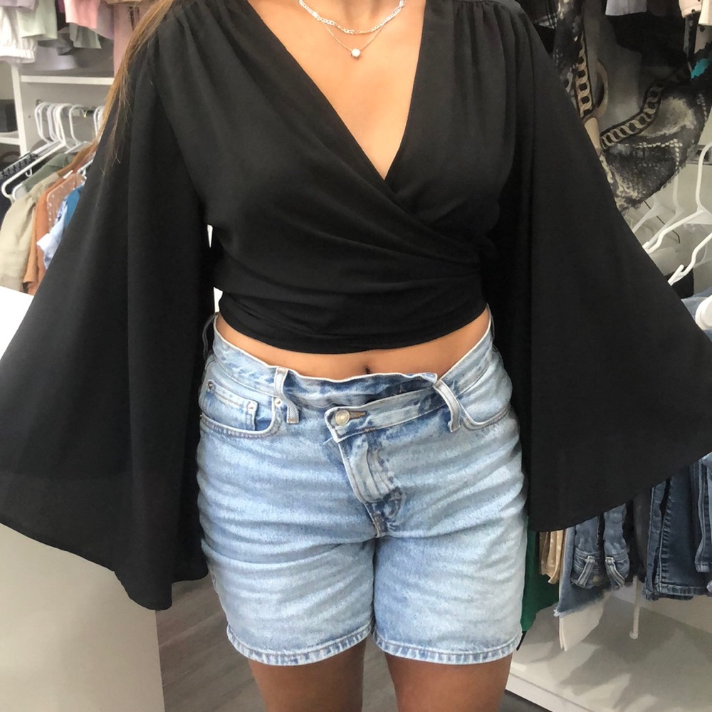 Stunning black self wrap top